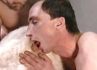 Mature blonde in a zoophile orgy